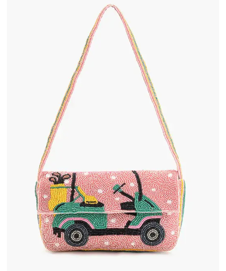 Discover rhinestone golf glasses, beaded clutches, and country club glam perfect for the course or the 19th hole