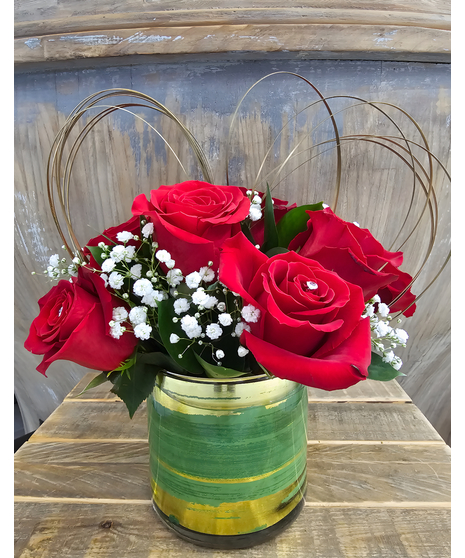 Red rose bouquet in quantity of 6 or 9 stems with diamante pins for shine. 